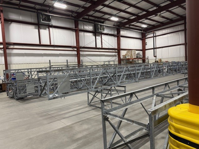 Steel fabrication frames inside the Signal facility